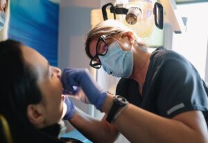 Surgeon performing oral surgery in Fairfax, VA